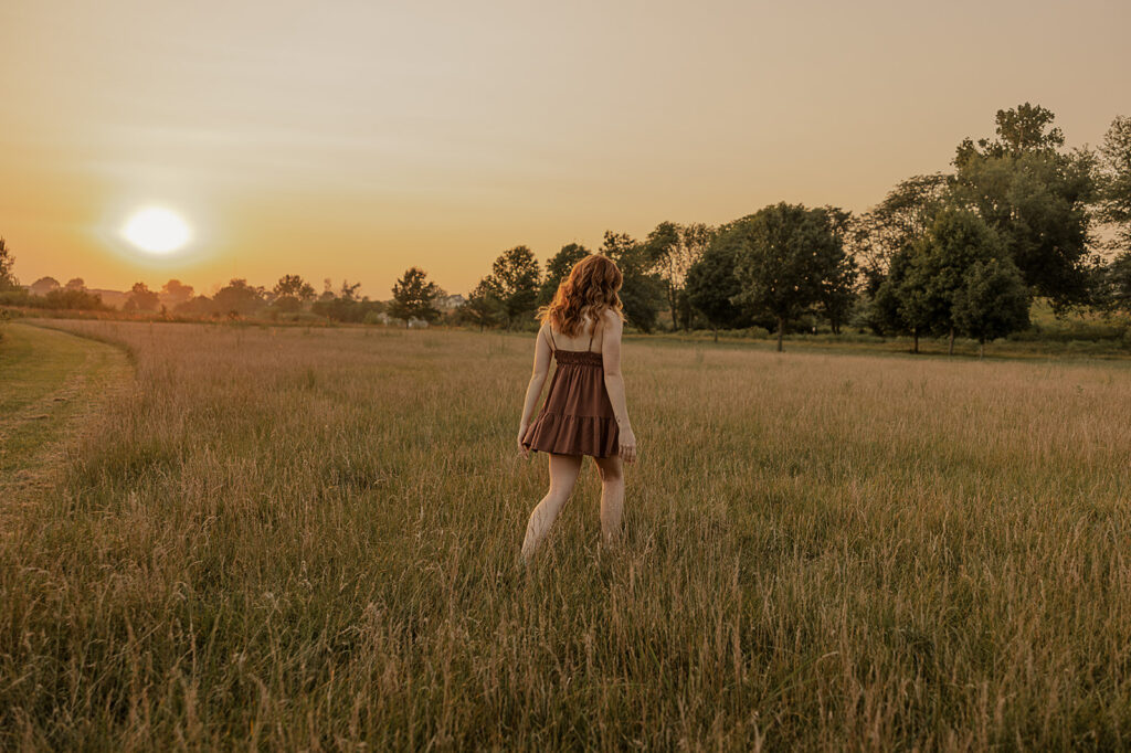 ames iowa senior photoshoot in tallgrass field