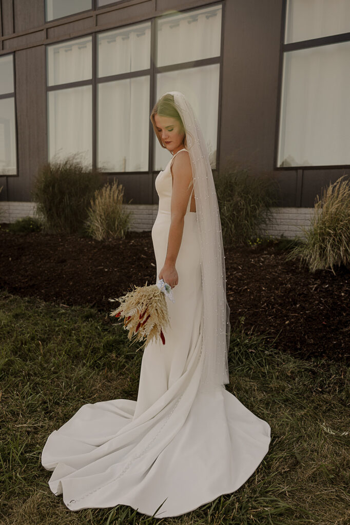 bride getting ready wedding photos in dress