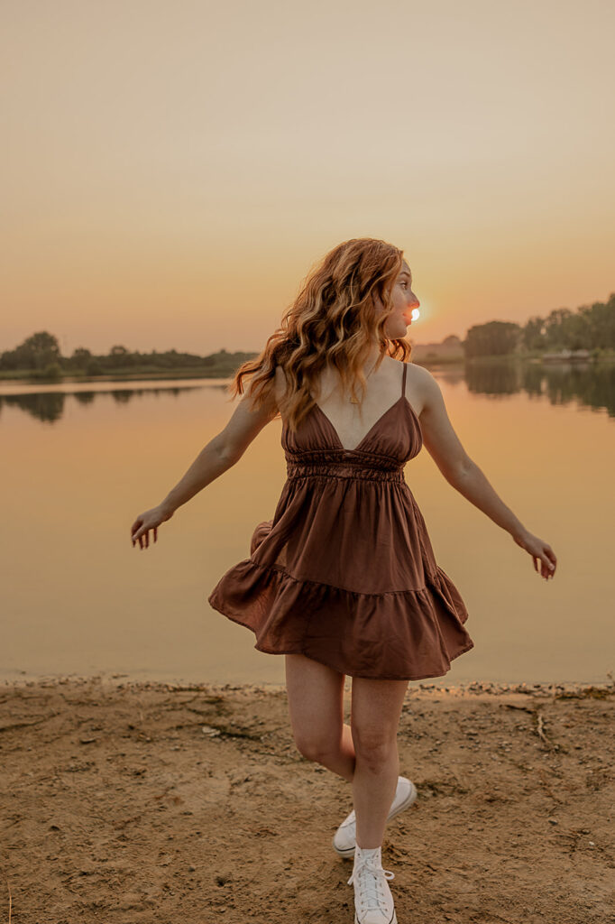 candid senior photo poses golden hour sunset