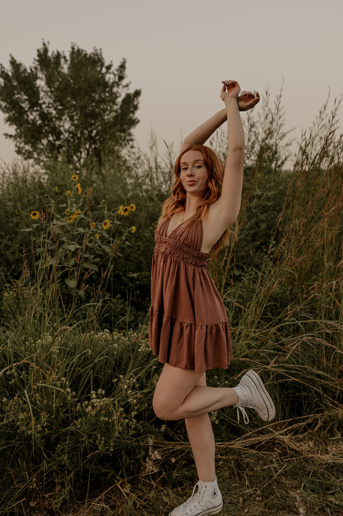 editorial and creative poses in tallgrass field