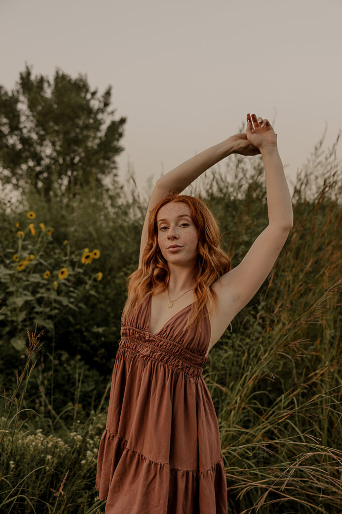 editorial and creative poses in tallgrass field