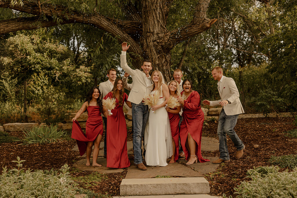 outdoor wedding bridals with bridal party during golden hour iowa wedding photographer