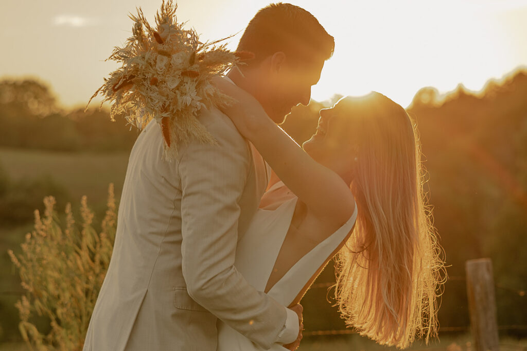 outdoor wedding bridals with bride and groom during golden hour iowa wedding photographer