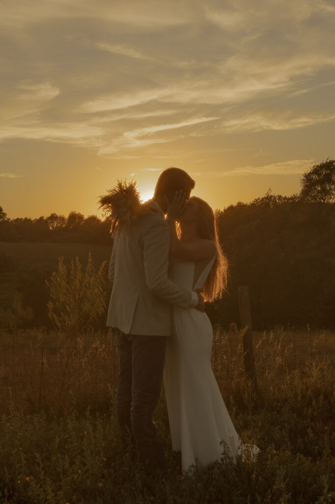 hazy sunset bride and groom photos in iowa