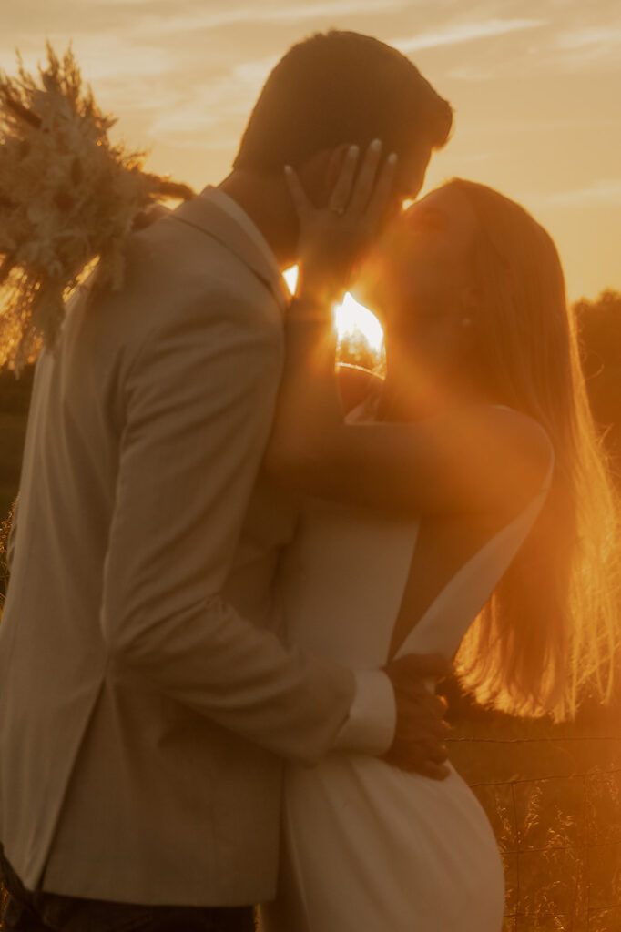 hazy sunset bride and groom photos in iowa