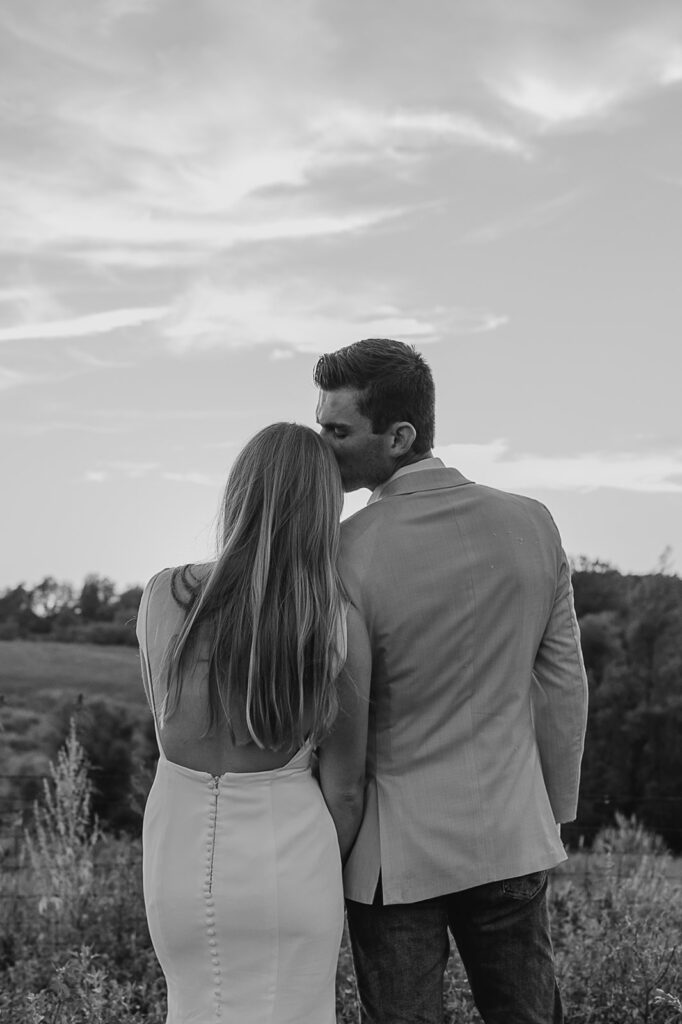 outdoor Iowa wedding portraits bride and groom golden hour