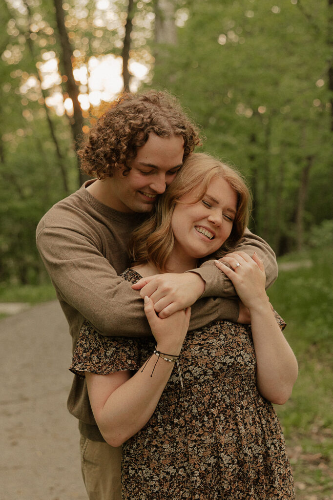 summer engagement photos with dog outdoors