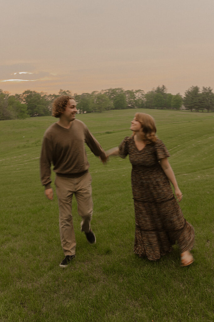 candid and romantic couple poses iowa engagement photographer