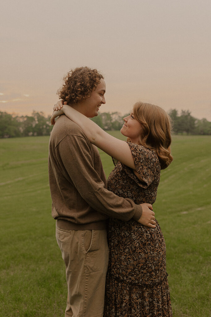 candid and romantic couple poses iowa engagement photographer