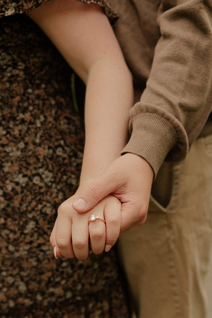 documentary style engagement photos in iowa with puppy