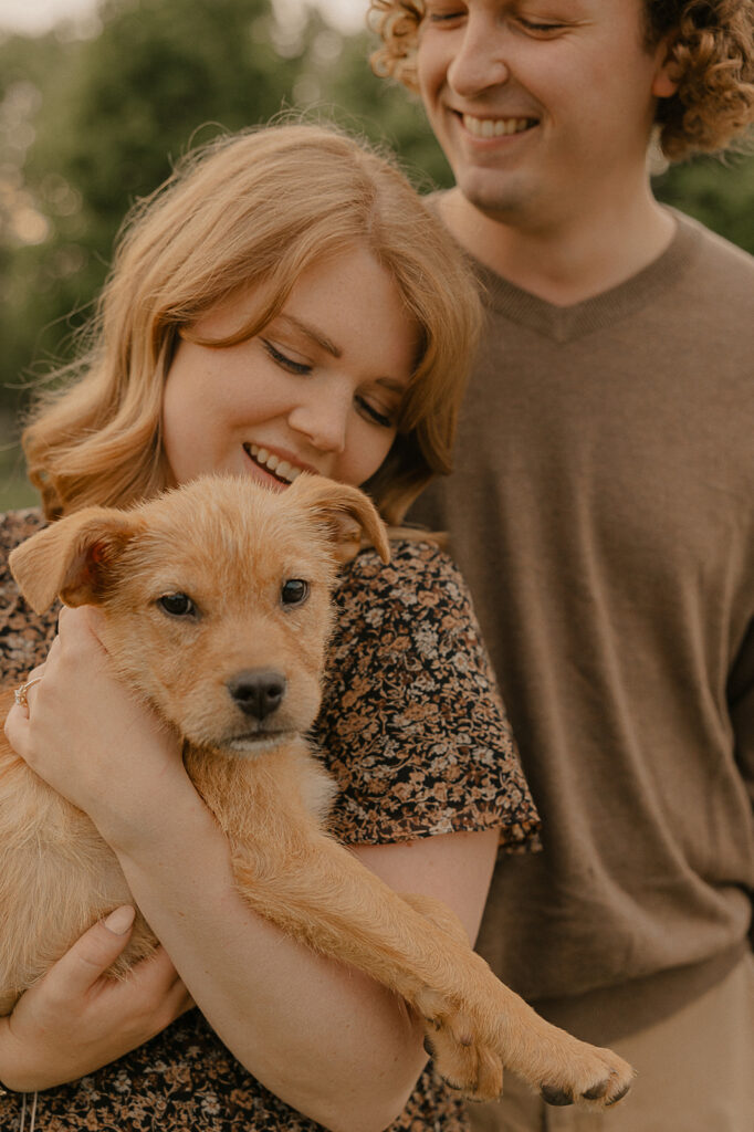 summer engagement photos with dog outdoors