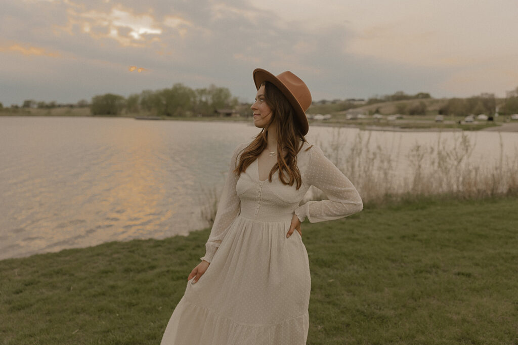 girl looking off into the distance at ames iowa lake