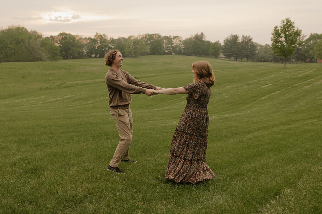 couple spinning in a circle candid and romantic poses