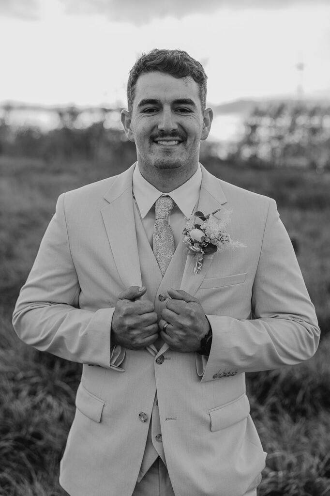 groom portraits outdoors golden hour