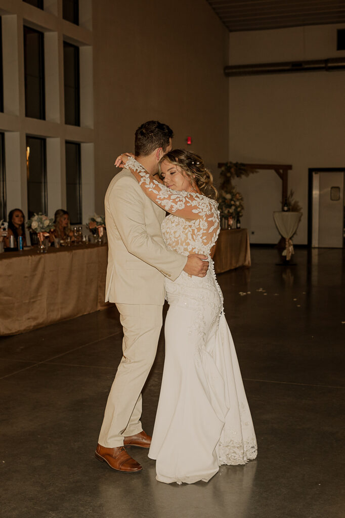 flash photography wedding reception photos first dance with bride and groom