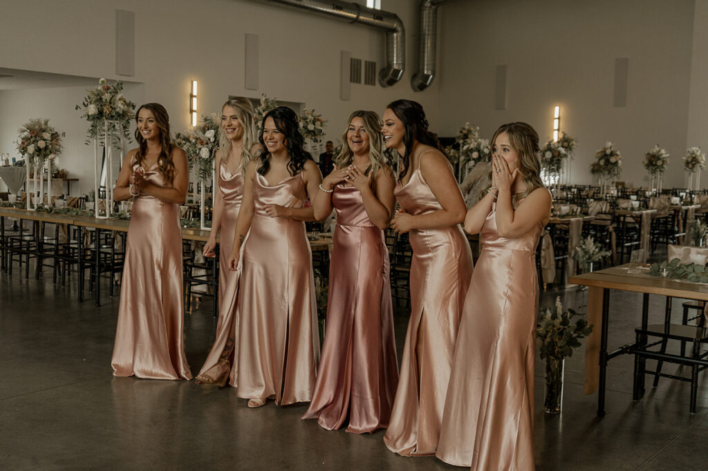 bridesmaids first look fall wedding indoors at eagles ledge