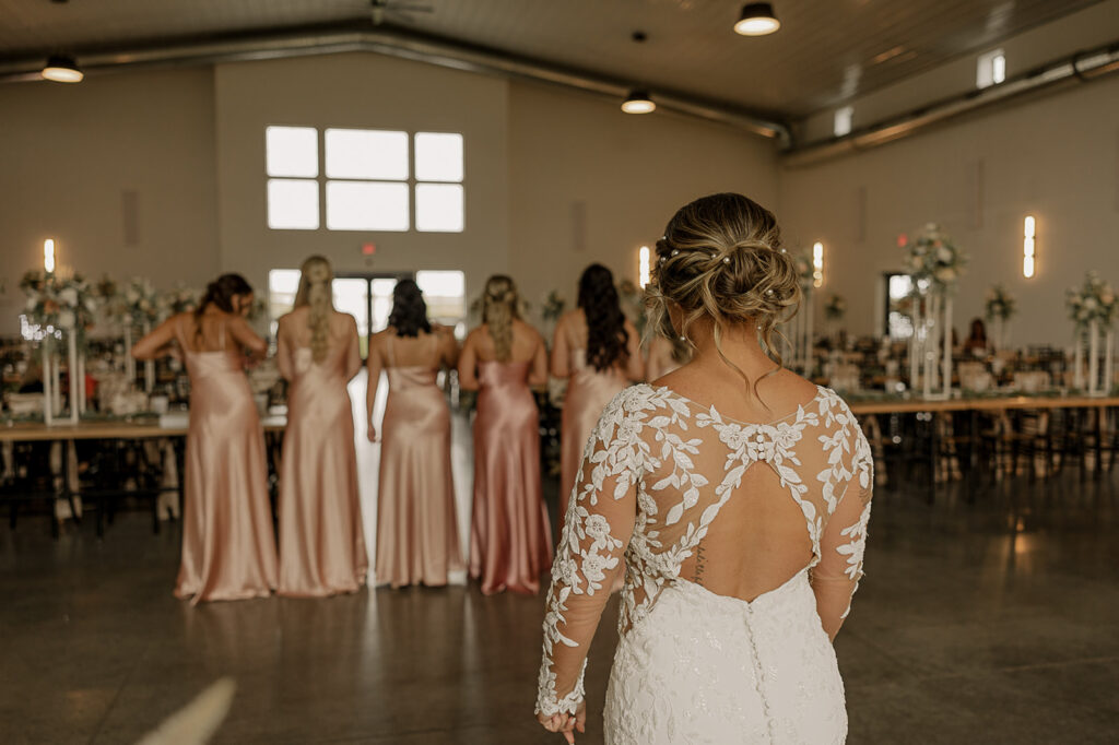 bridesmaids first look fall wedding indoors at eagles ledge