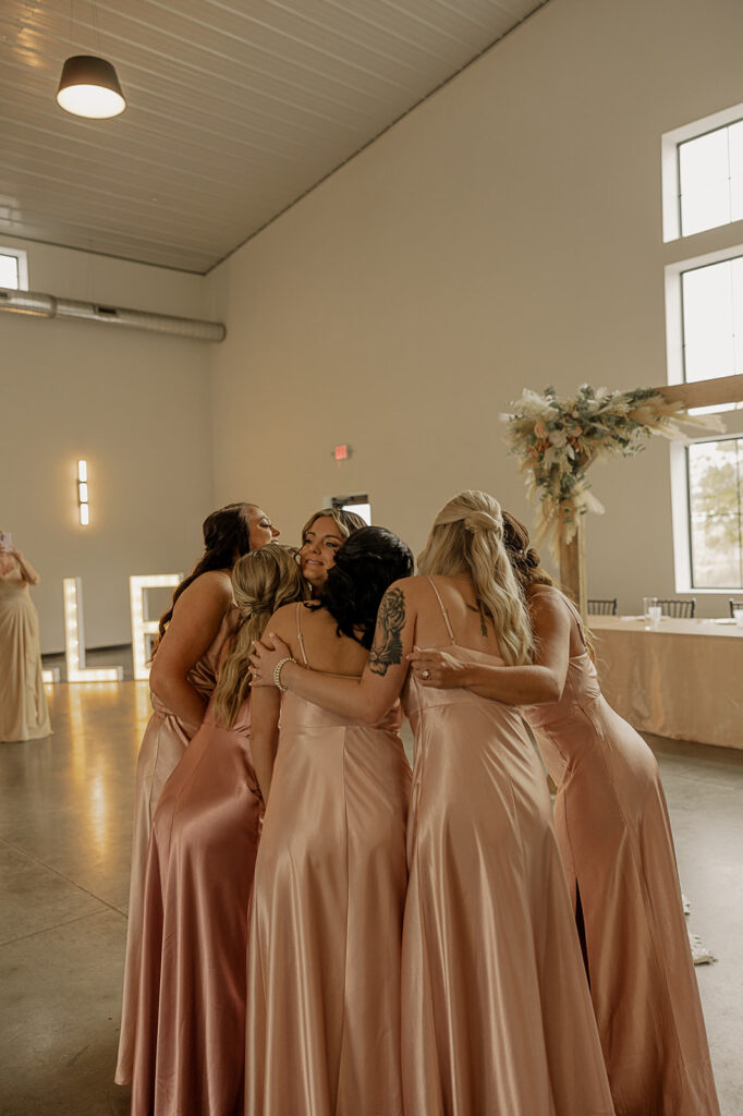 bridesmaids first look fall wedding indoors at eagles ledge