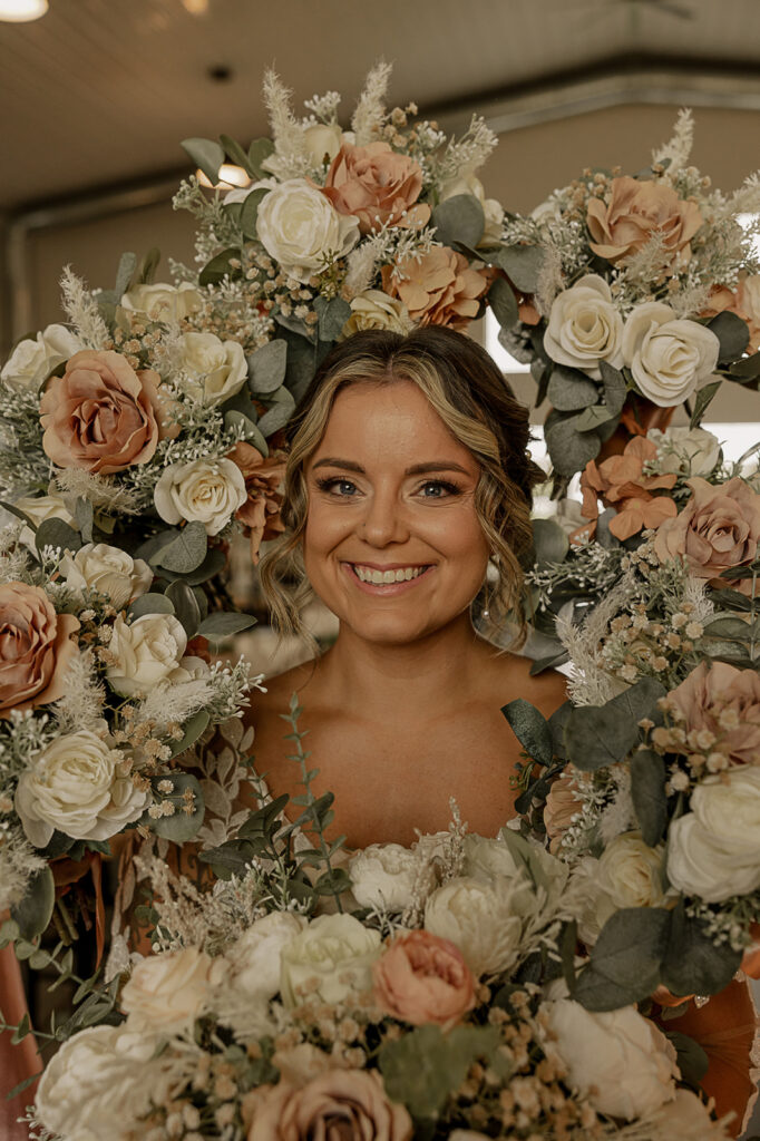 bridesmaid bouquets around bride photos