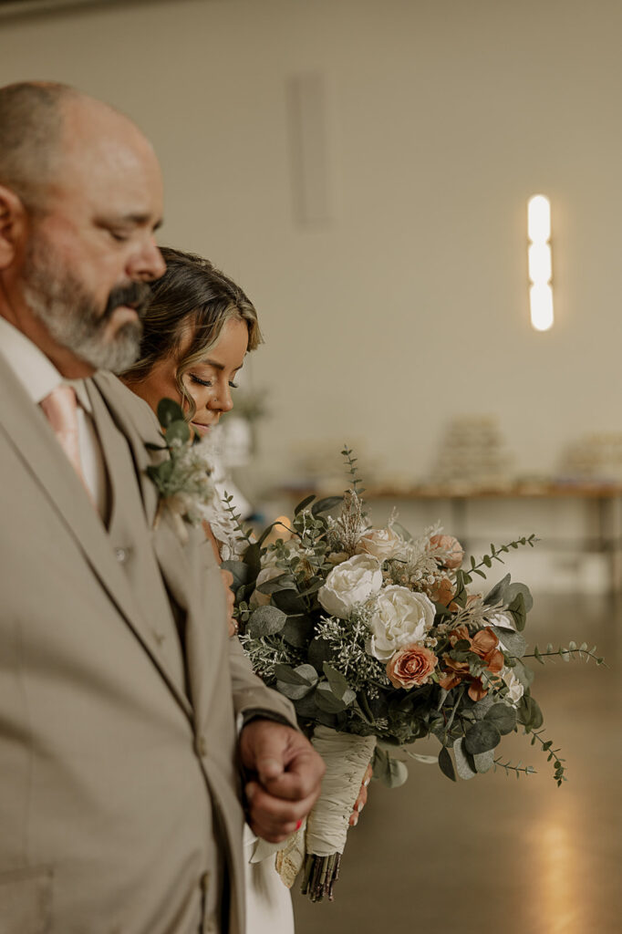 dad walking bride down the aisle