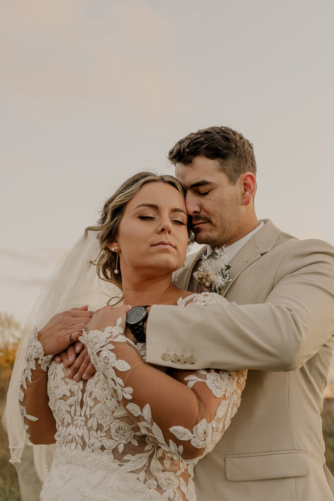 golden hour bridals with bride and groom at iowa wedding