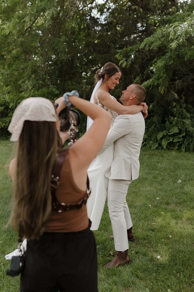 photographer branding photos at wedding