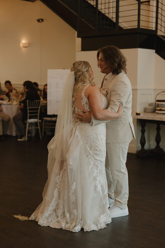 bride and groom first dance at the district venue in iowa