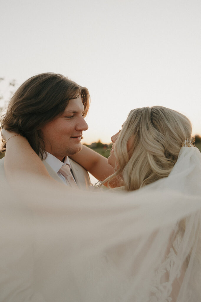 golden hour sunset wedding photos with bride and groom