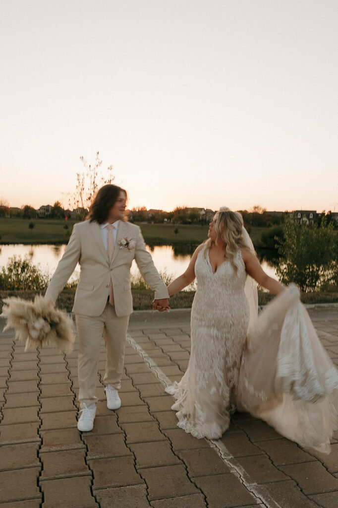 golden hour sunset wedding photos with bride and groom