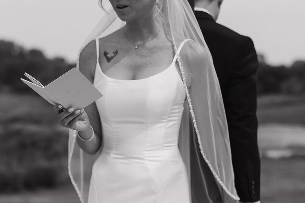 bride and groom sharing private vows first touch