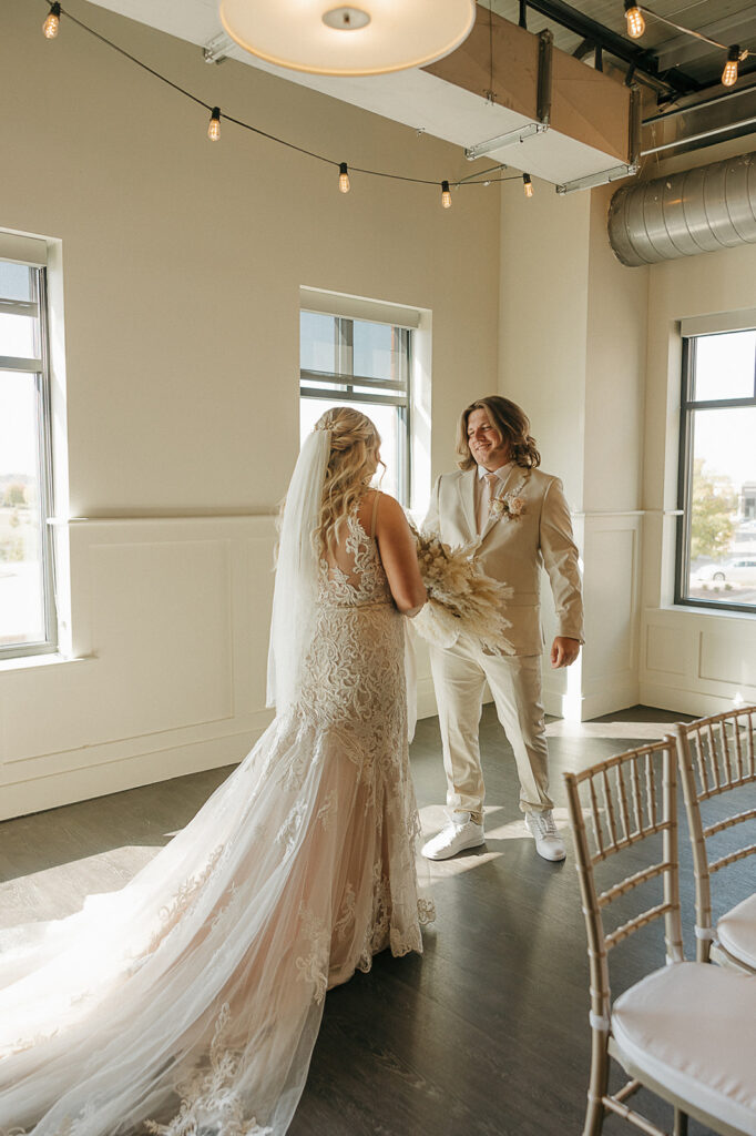 first look with bride and groom in the district venue