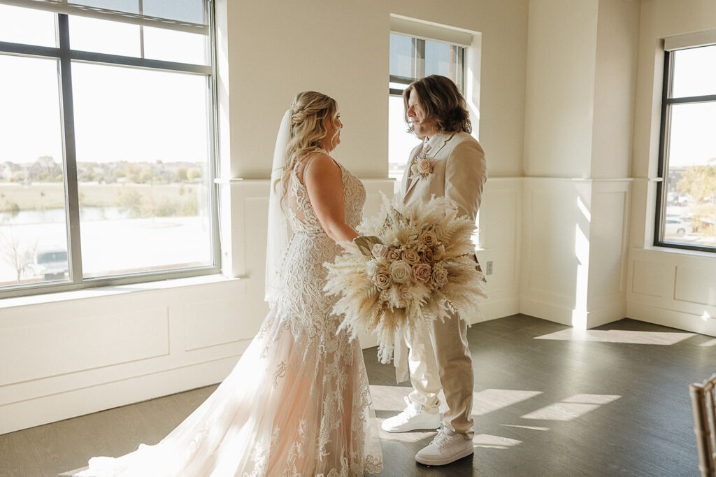 first look with bride and groom indoor portraits