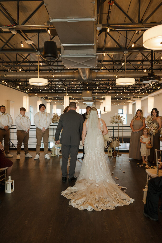 indoor iowa wedding ceremony in the district venue