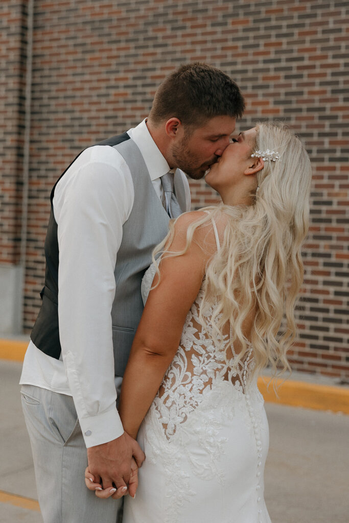 bride and groom poses romantic