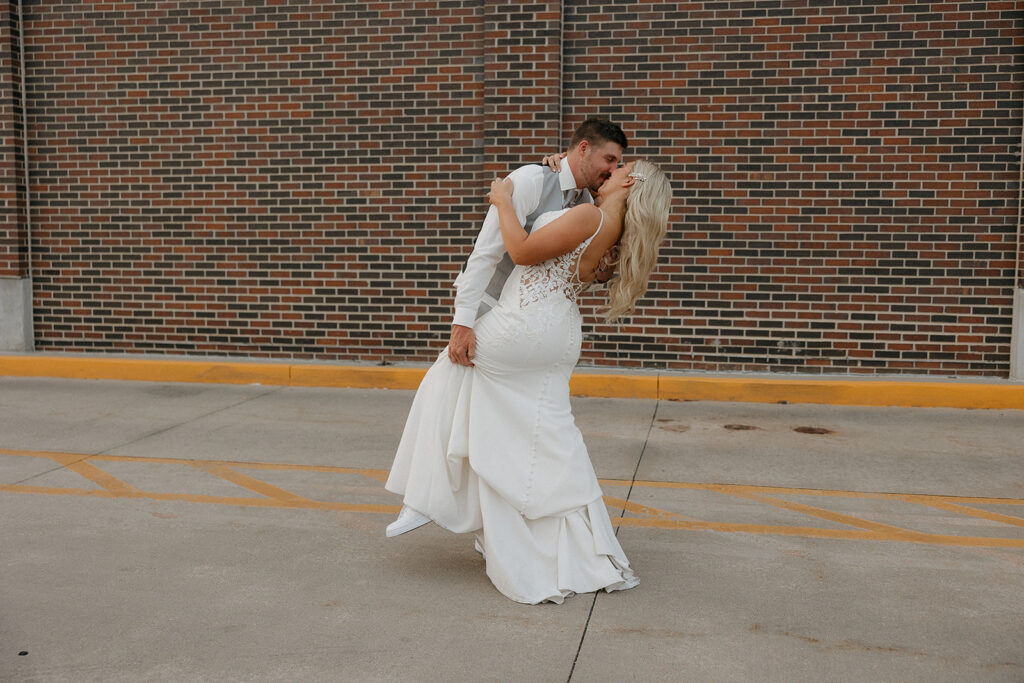 bride and groom poses romantic