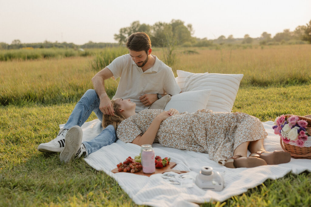 golden hour candid couple photos with a picnic