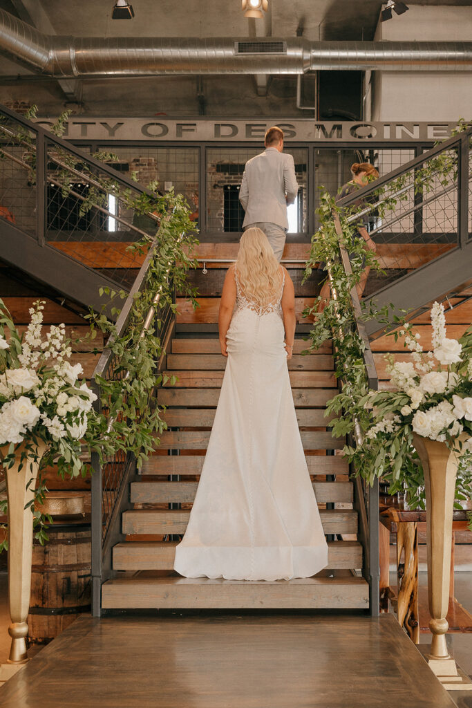 documentary style wedding photos in the river center des moines