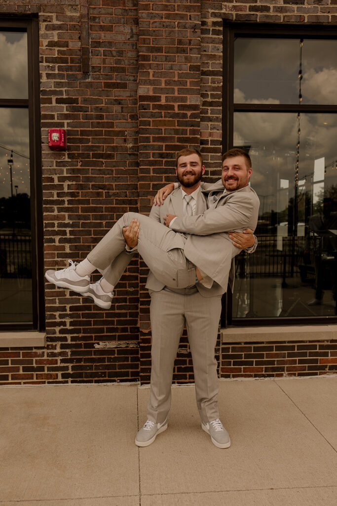 documentary style wedding photos in the river center des moines