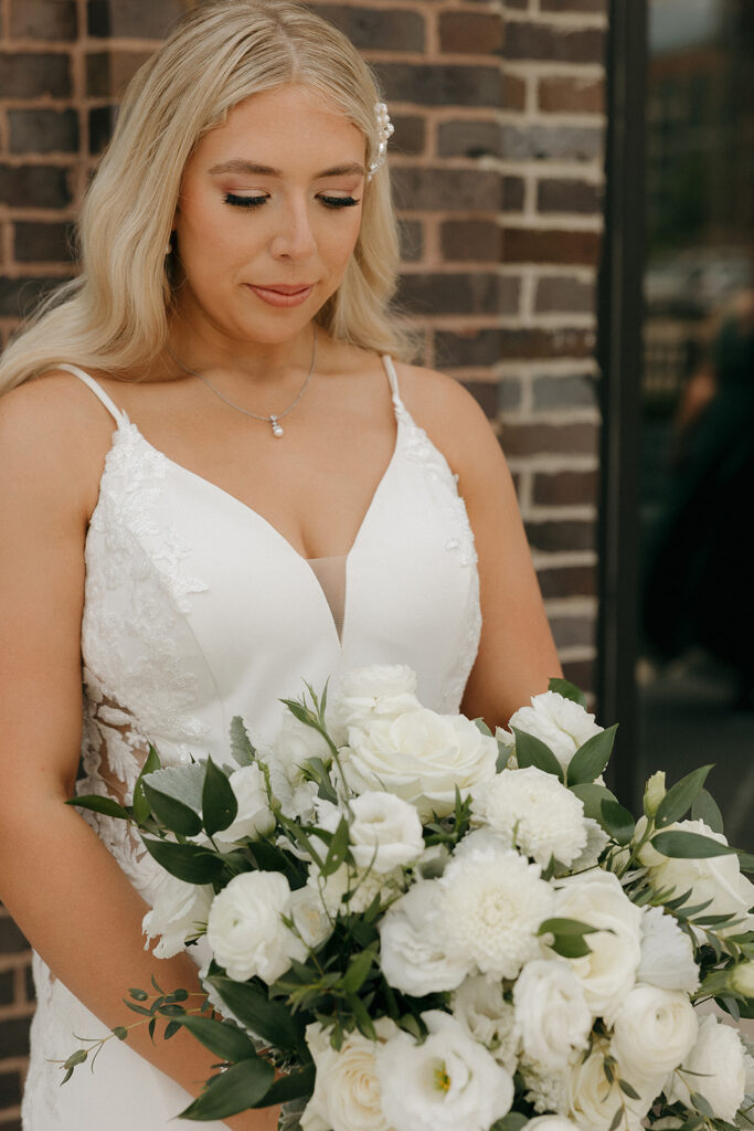 documentary style wedding photos in the river center des moines