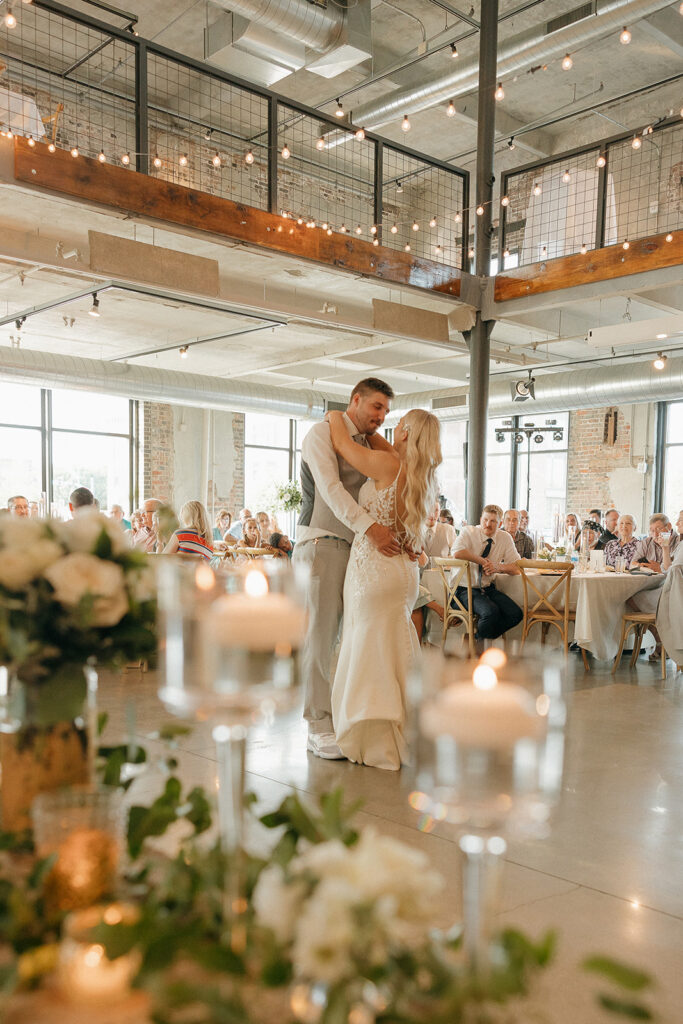 bride and groom poses romantic