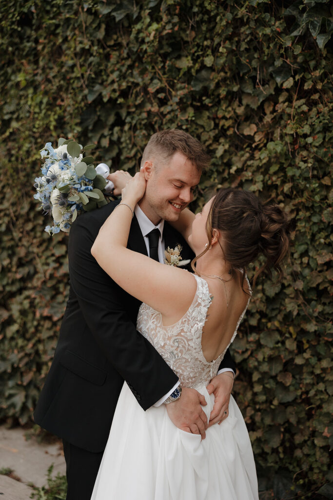 downtown des moines portraits with bride and groom