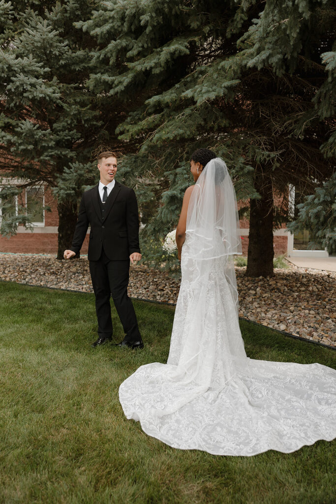 first look with bride and groom outdoor wedding photos