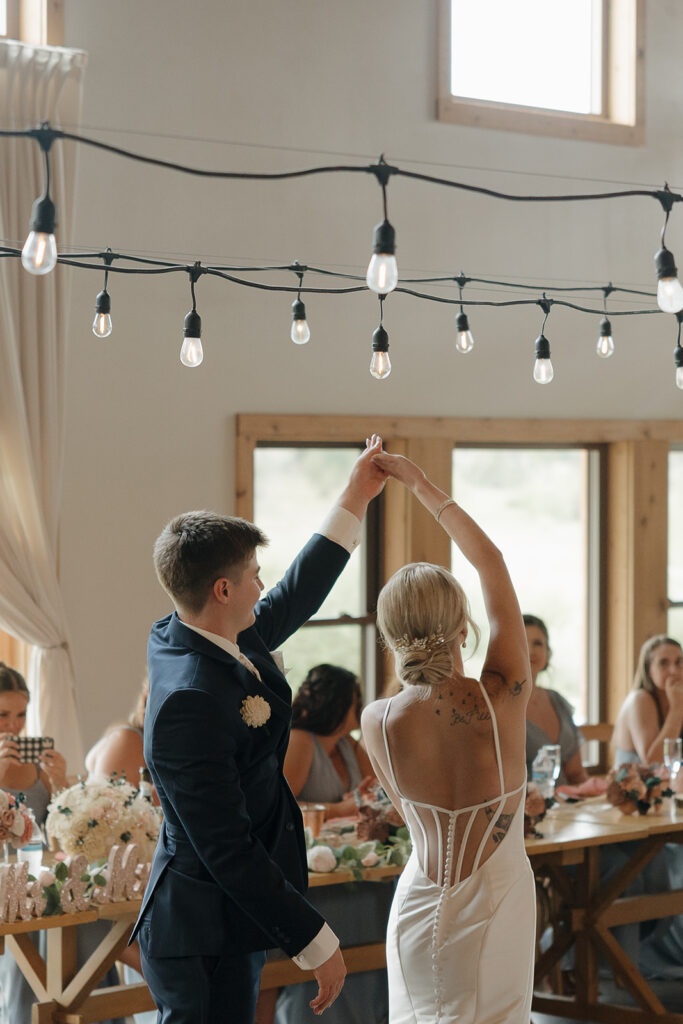 bride and groom first dance during reception