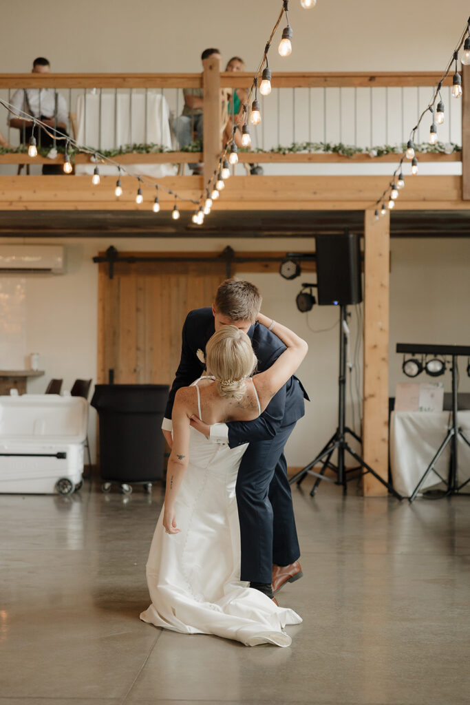 bride and groom first dance during reception