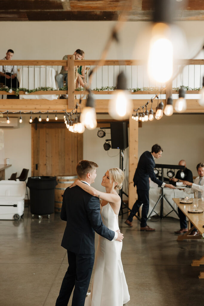 bride and groom first dance during reception