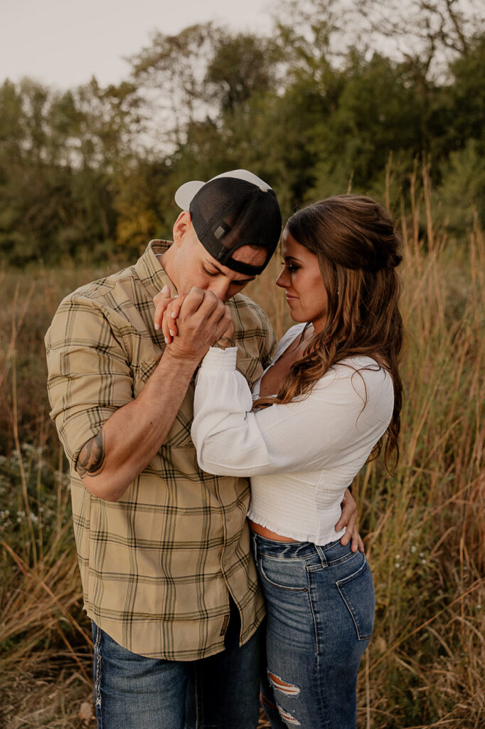 candid engagement photos in ames iowa with a des moines engagement photographer