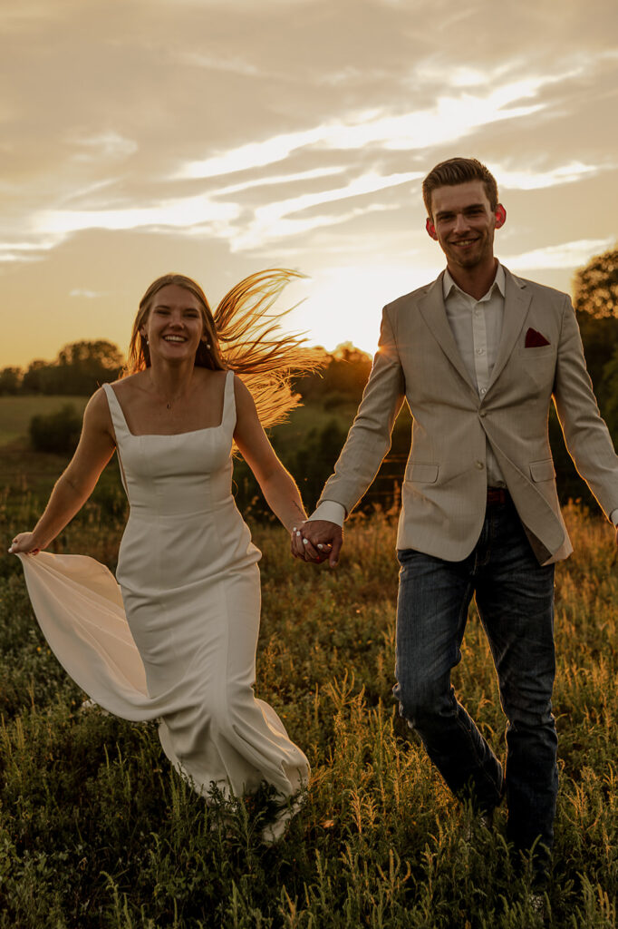 candid and playful bride and groom portraits during sunset