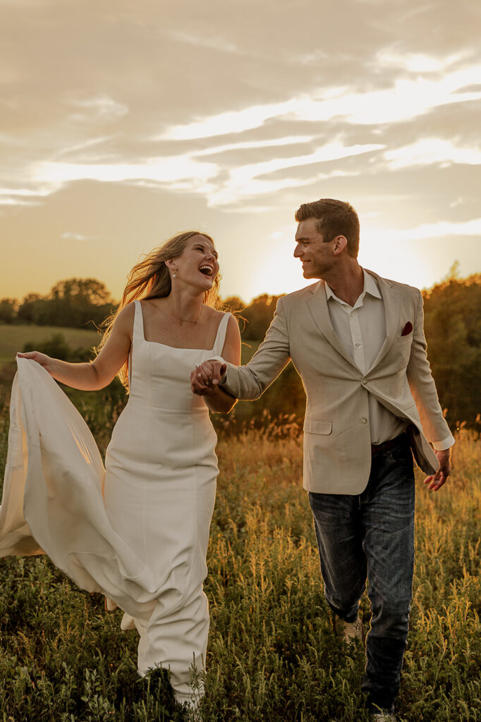 candid and playful bride and groom portraits during sunset