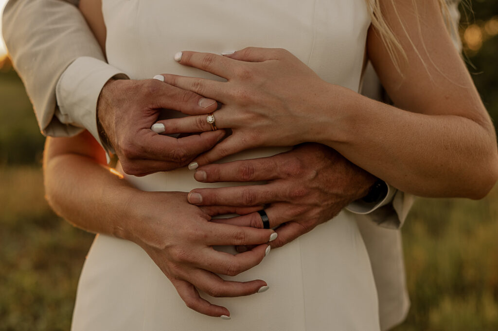 candid and playful bride and groom portraits during sunset