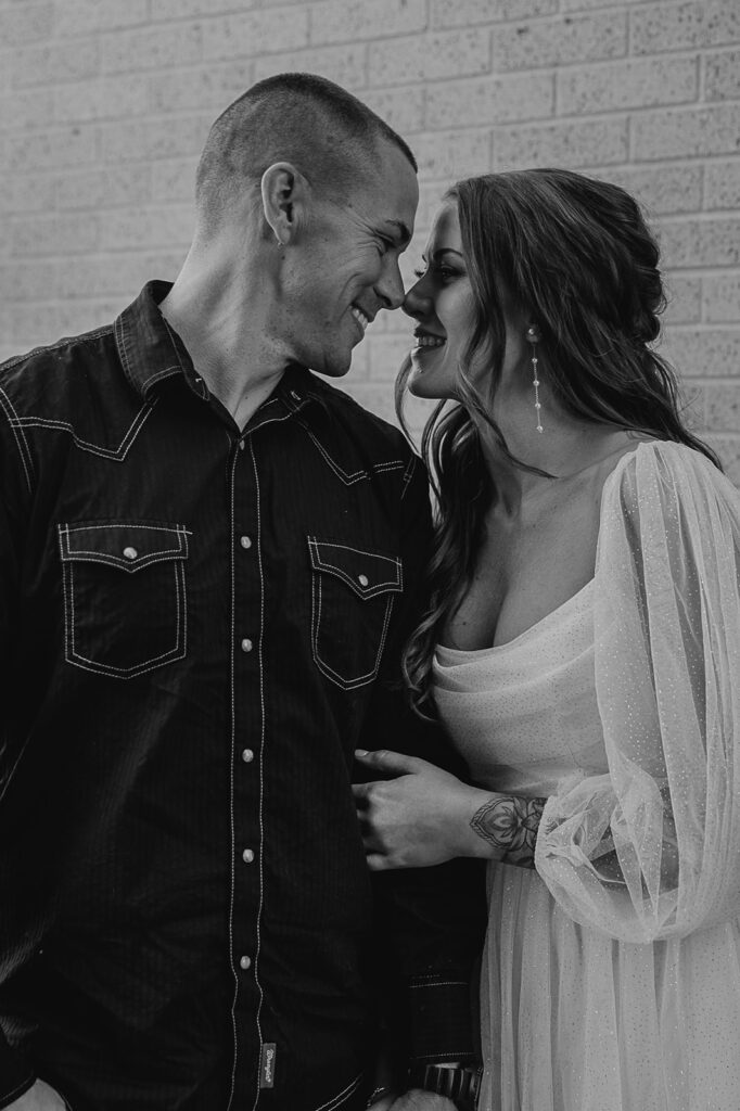 candid engagement photos in ames iowa with a des moines engagement photographer